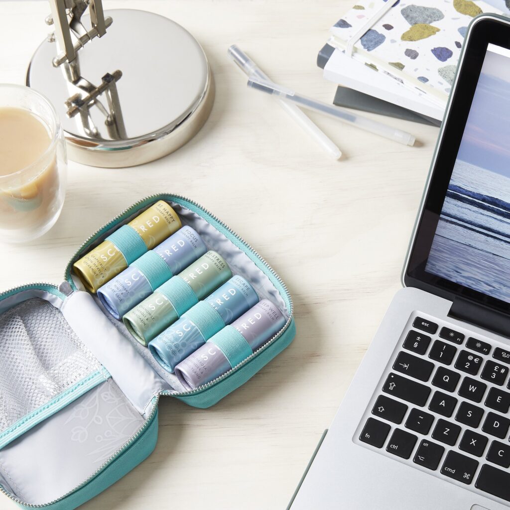 aromatherapy products on a desk in home office